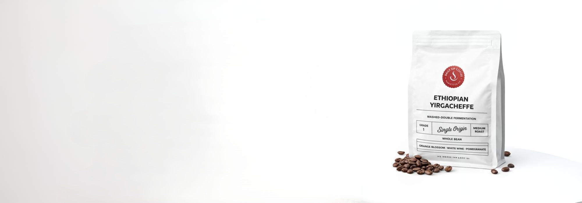 White coffee bag with red logo and text on a white background